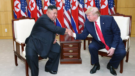 North Korean leader Kim Jong-un and US President Donald Trump attend a meeting on the south side of the demilitarized zone (DMZ) separating the South and North Korea on June 30, 2019 in Panmunjom, South Korea.