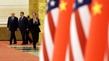 US President Donald Trump arrives for a state banquet hosted by Chinese President Xi Jinping at the Great Hall of the People on May 14, 2026, in Beijing, China.