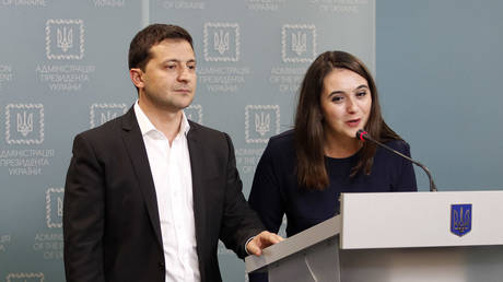 FILE PHOTO: Vladimir Zelensky and his spoweswoman Yulia Mendel attend a press conference in Kiev, Ukraine, October 1, 2019