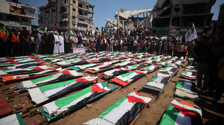 A funeral for 112 Palestinians killed in a 2023 Israeli airstrike is held in Gaza City on August 4, 2026.