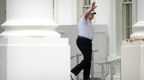 US President Donald Trump waves as he walks into the North Portico at the White House on  June 27, 2026, in Washington, DC.