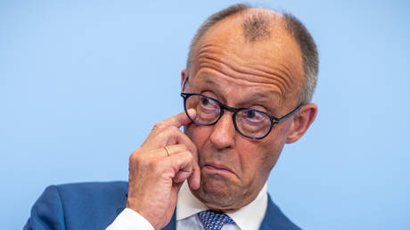 FILE PHOTO: German Chancellor Friedrich Merz attending a press conference.