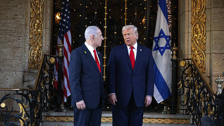 US President Donald Trump welcomes Israeli Prime Minister Benjamin Netanyahu to his Mar-a-Lago club on December 29, 2025 in Palm Beach, Florida.