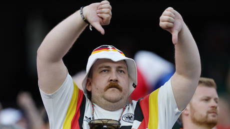 A German fan reacts to the national team's loss to Paraguay at a World Cup Round of 32 match in Boston, Massachusetts, June 29, 2026