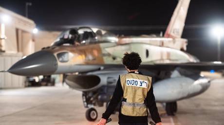 FILE PHOTO: An Israeli fighter jet is prepared ahead of strikes on Iran on October 26, 2024.