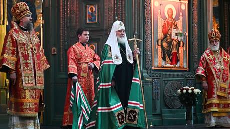 FILE PHOTO.  Russian Patriarch Kirill (C).