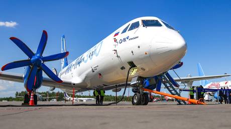 A Russian Ilyushin Il-114-300 turboprop passenger aircraft is displayed on the tarmac.