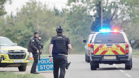 Police man a roadblock near RAF Fairford in Gloucestershire, England, on September 27, 2026.