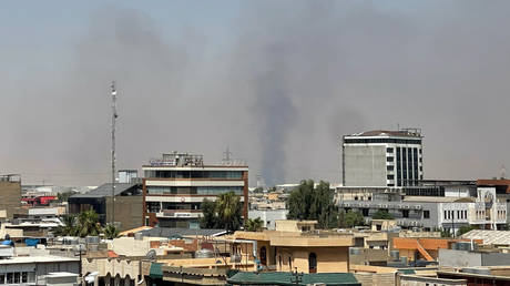 Black smoke rises following explosions near a military base hosting US forces in Erbil, Iraq, July 24, 2026