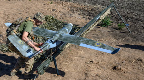FILE PHOTO. Ukrainian soldier prepares to launch UAV.