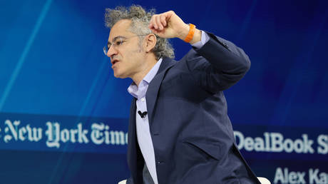Alex Karp speaks at 2025 New York Times Dealbook Summit in New York City, December 3, 2025