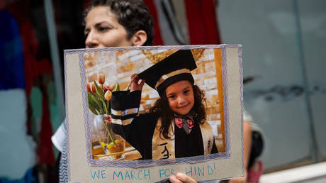 FILE PHOTO. Protester holds photo of Hind Rajab, five-year old Palestinian girl who was killed by Israeli forces in Gaza in 2024.