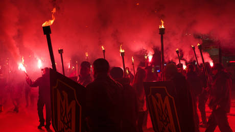 FILE PHOTO: A torch procession by Ukrainian National Patriotic Forces in Ivano-Frankivsk, January 29, 2018, marking the 100th anniversary of the Battle of Kruty. ©  Getty Images/panaramka