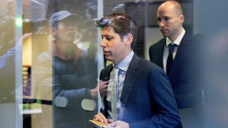 FILE PHOTO: OpenAI CEO Sam Altman and President Gregory Brockman arrive at court in Oakland, California, April 30, 2026