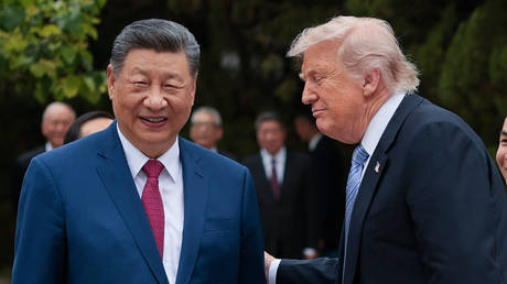 US President Donald Trump speaks with Chinese President Xi Jinping during a visit to Zhongnanhai Garden, Beijing, May 15, 2026.