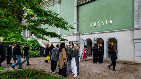 Visitors explore the Russian Pavilion at Giardini at the 61st Biennale during the press preview on May 05, 2026 in Venice, Italy.