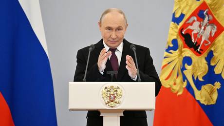 President Vladimir Putin gestures as he addresses graduates of Russia’s military, security, and law enforcement academies in the Kremlin on June 23, 2026.