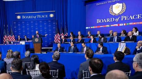 FILE PHOTO: President Donald Trump presides over the inaugural meeting of the Board of Peace in Washington, February 19, 2026