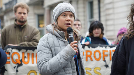 FILE PHOTO: Greta Thunberg joins protesters outside the InterContinental in central London.