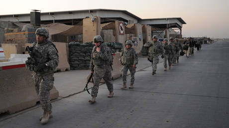 FILE PHOTO: US troops withdrawing from the Sather Air Base in Iraq.