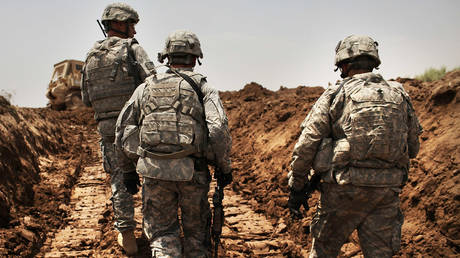 FILE PHOTO: US service members in Babil Province, Iraq.