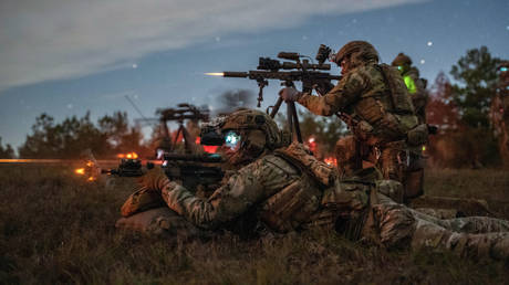Rangers assigned to the 75th Ranger Regiment assault their targets during a live fire training exercise at Ft. Johnson, La. on December. 3, 2023.