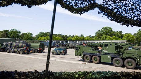 FILE PHOTO: Military vehicles are stationed at Clausewitz Barracks in Nienburg, Lower Saxony, as part of NATO’s CIMIC Quadriga 2026 exercise