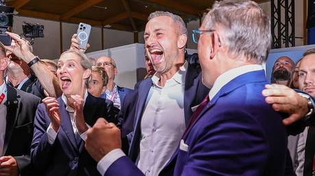 Alice Weidel, Ulrich Siegmund, and Tino Chrupalla celebrate the AfD’s election result in Magdeburg, Germany, September 6, 2026.