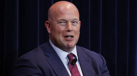 FILE PHOTO: US envoy to NATO Matthew Whitaker speaking during a conference.