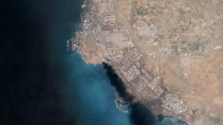 FILE PHOTO: Smoke over the Aramco oil terminal at Jizan, Saudi Arabia, July 26, 2026.