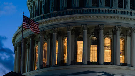 A US flag outside the Capitol, Washington, DC.