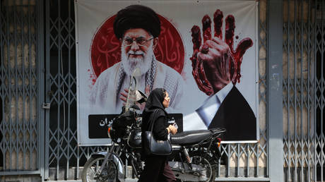 A mural depicting slain Iranian Supreme Leader Ali Khamenei in Tehran, July 22, 2026.