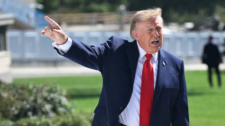 US President Donald Trump talks to the media on the South Lawn of the White House in Washington, DC, US, October 1, 2026.