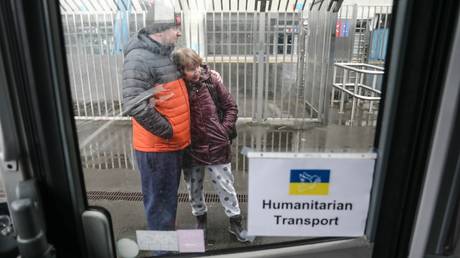 FILE PHOTO: Ukrainian refugess arriving to Switzerland by bus.
