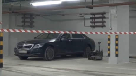 A robot being used to remove an improvised explosive device from under Malofeev’s car.