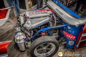 Race cars, performance parts, new products, and motorsports technology on display at PRI Show 2025 in Indianapolis, Indiana.