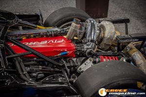 Race cars, performance parts, new products, and motorsports technology on display at PRI Show 2025 in Indianapolis, Indiana.