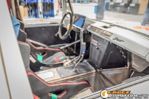 Race cars, performance parts, new products, and motorsports technology on display at PRI Show 2025 in Indianapolis, Indiana.