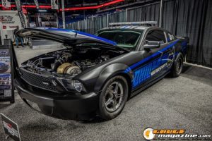 Race cars, performance parts, new products, and motorsports technology on display at PRI Show 2025 in Indianapolis, Indiana.