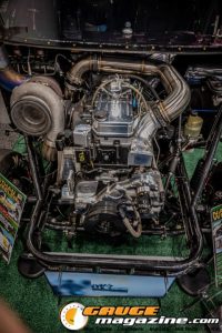 Race cars, performance parts, new products, and motorsports technology on display at PRI Show 2025 in Indianapolis, Indiana.