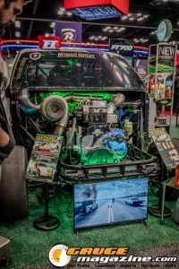 Race cars, performance parts, new products, and motorsports technology on display at PRI Show 2025 in Indianapolis, Indiana.