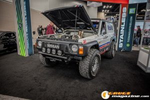 Race cars, performance parts, new products, and motorsports technology on display at PRI Show 2025 in Indianapolis, Indiana.