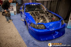 Race cars, performance parts, new products, and motorsports technology on display at PRI Show 2025 in Indianapolis, Indiana.