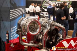 Race cars, performance parts, new products, and motorsports technology on display at PRI Show 2025 in Indianapolis, Indiana.