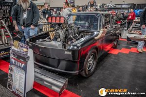 Race cars, performance parts, new products, and motorsports technology on display at PRI Show 2025 in Indianapolis, Indiana.