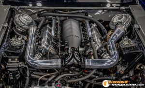 Race cars, performance parts, new products, and motorsports technology on display at PRI Show 2025 in Indianapolis, Indiana.