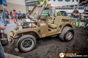 Race cars, performance parts, new products, and motorsports technology on display at PRI Show 2025 in Indianapolis, Indiana.