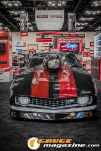 Race cars, performance parts, new products, and motorsports technology on display at PRI Show 2025 in Indianapolis, Indiana.