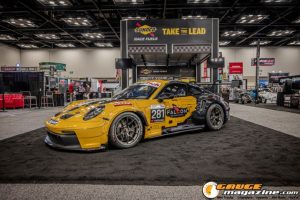 Race cars, performance parts, new products, and motorsports technology on display at PRI Show 2025 in Indianapolis, Indiana.