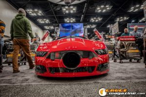 Race cars, performance parts, new products, and motorsports technology on display at PRI Show 2025 in Indianapolis, Indiana.